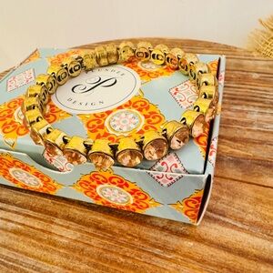 Plunder Design Retired Kayson Magnetic Bangle in peach and antique gold tone